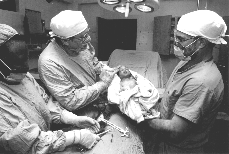 a child is born where there were no doctors Rwandan child is born