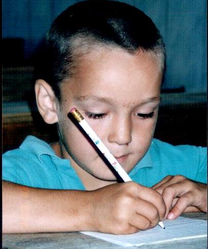 orphan child learning to write