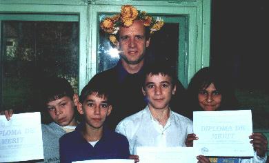 four of the grads of our computer course with the guest of honor