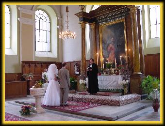 Bride and groom before the altar